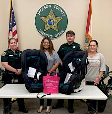 Chipola Healthy Start's Janai Groomes and Abby Golden with JCSO Deputies